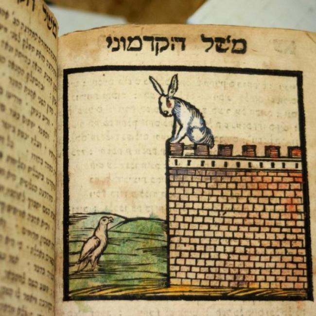 Fable of the Ancient illustration of a hare perched on a stone wall