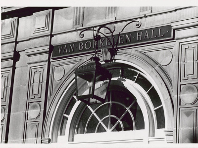 Van Bokkelen Hall sign and lantern above the building's main entrance