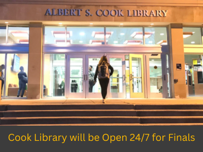 girl walking up stairs and into cook library 