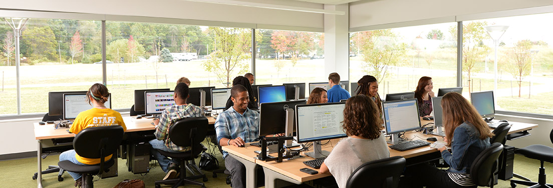Students studying happily at the computer lab at TU Northeastern